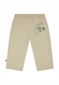 Beige, katoenen cropped broeken met een elastische tailleband. Heeft een groene print van olijfblaadjes en tekst op het rechterbeen.