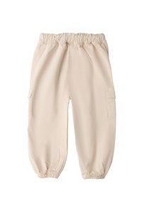 Beżowe spodnie cargo z elastycznym paskiem w talii i ściągaczami na końcach nogawek, z bocznymi kieszeniami i gładką, lekką teksturą materiału.