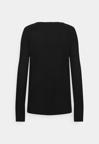 Svart långärmad stickad tröja med ribbad textur, visad liggande mot en vit bakgrund.