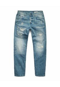 Light blue distressed jeans with a patch on the left leg, featuring frayed edges, subtle fading, and multiple rips throughout.