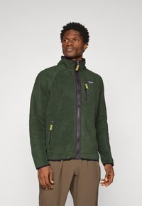 Fleece jacket in dark green with a textured finish, high collar, front zipper, and two zippered side pockets with contrasting zipper pulls.