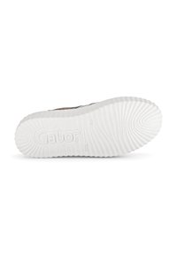 La suola delle sneaker Gabor presenta un materiale in gomma bianca con una texture rigata. Il marchio è impresso al centro, con un battistrada decorato per garantire la presa.