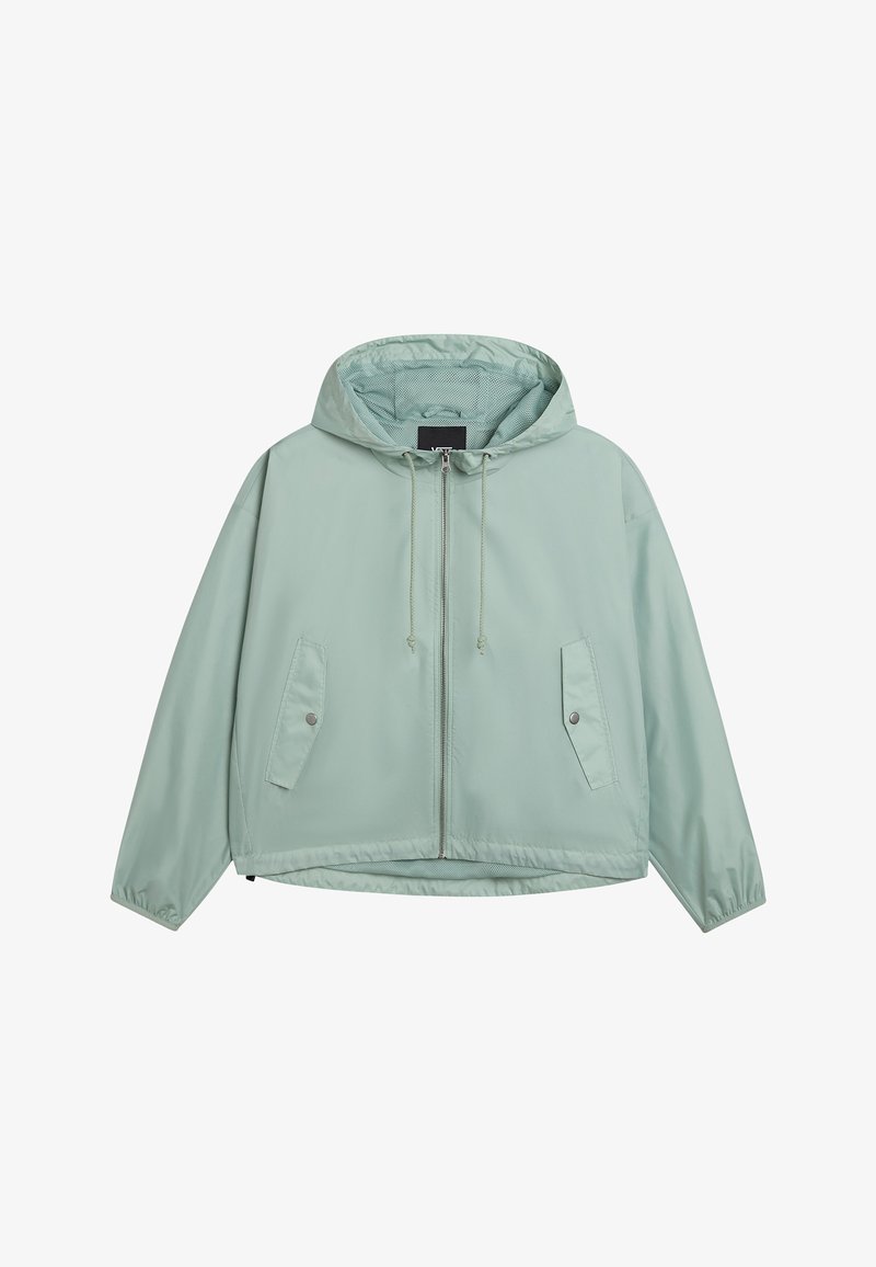 Veste à capuche zippée vert clair avec cordons, deux poches avant à rabat avec boutons-pression, et poignets élastiques.