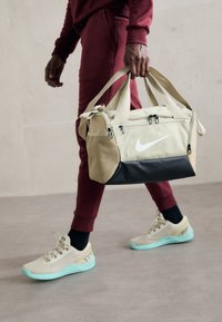 BRASILIA XS DUFFLE 25L UNISEX - Sports bag - desert khaki/black/sail