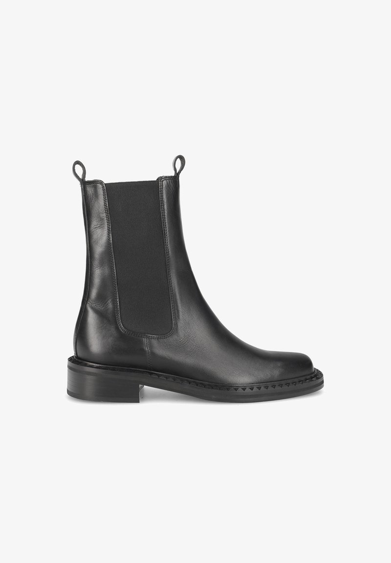 Bottines Chelsea en cuir noir avec des panneaux élastiques sur les côtés, des tirettes et un bout arrondi. Dispose d'un talon bas empilé et de coutures décoratives.