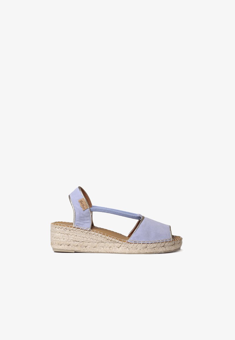 Light blue espadrille wedge sandal with canvas upper and braided jute sole. Features open toe, slingback strap, and elastic accents.