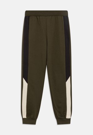 Spodnie dresowe w kolorze oliwkowej zieleni z elastycznym pasem i ściągaczami, z czarnymi i beżowymi kontrastującymi paskami po bokach.