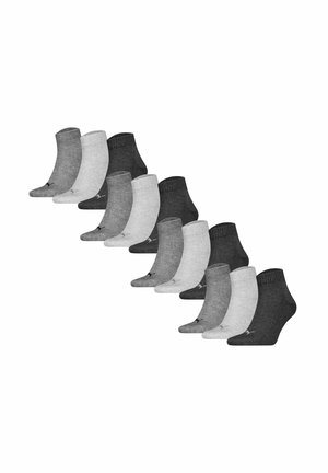 Blandade ankelsockor i grå och ljusgrå nyanser. Mjukt material med ribbat avslut. Inkluderar sex par, designade för komfort och hållbarhet.