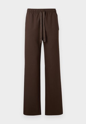 Pantalons larges marron avec une taille élastique et un cordon de serrage ajustable. Comprend des poches latérales et une texture lisse.