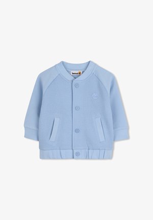 Lichtblauw jack met knopen, bestaande uit een gestructureerd lijf, effen mouwen, geribde boorden en zoom. Heeft twee voorzakken en een logo-accent.