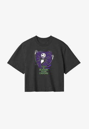 Sort bomulds t-shirt med grafik af Jack Skellington med lilla spiralbaggrund og grøn tekst, der lyder "The Nightmare Before Christmas."
