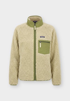 Veste en polaire sherpa beige avec col vert olive, fermeture éclair et poche poitrine zippée, avec logo Patagonia sur la poitrine.