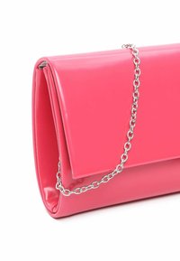 Pink patent leather handbag with a sleek, rectangular shape, featuring a silver chain strap and a fold-over flap closure.
