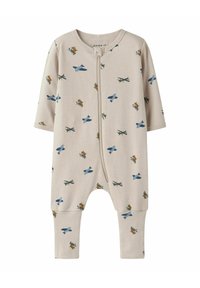 Combinaison en coton beige avec manches longues et fermeture éclair à l'avant, présentant des motifs d'avions bleus et d'écureuils bruns. Tissu doux et extensible.