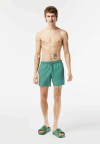 Lacoste Uimashortsit - vert kaki   vert