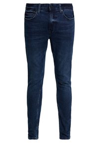 Jeans ajustados de denim en azul oscuro, con un diseño de cinco bolsillos, un ligero desvanecimiento y costuras en contraste a lo largo de las costuras.