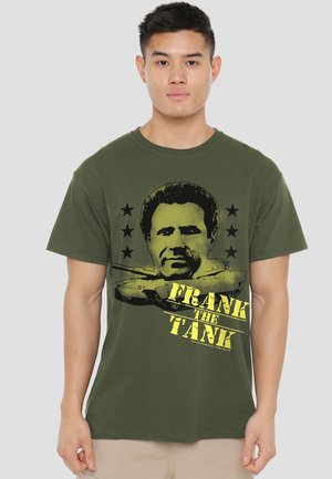 Olive green cotton t-shirt featuring a graphic print of a man's face with "FRANK THE TANK" in bold yellow text and black stars, round neckline.