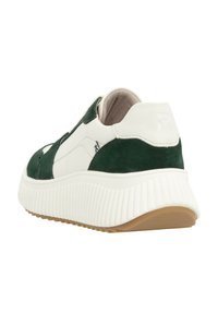 Green and white sneaker with suede and leather, rounded shape, thick ridged sole, and flat rubber bottom. Features minimal branding on the back.