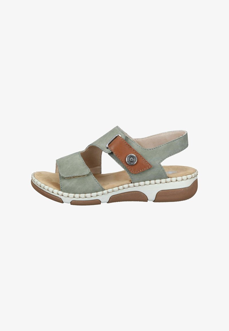 Sandale à bout ouvert verte et marron avec brides ajustables, semelle intérieure beige rembourrée et semelle épaisse blanche et marron pour le confort et le soutien.