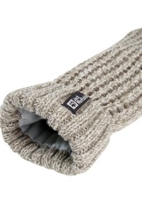 Strickhandschuh aus Wolle in hellbeige mit strukturiertem Muster, ausgestattet mit einem grauen Futter und einem schwarzen Logo-Patch am Bündchen.
