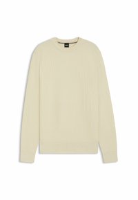 Maglione beige chiaro con un design a maglia waffle testurizzata, colletto a girocollo e polsini e orlo a coste. Forma semplice e moderna senza ulteriori decorazioni.