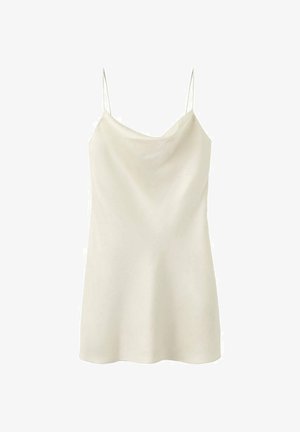 Cami top v krémovej farbe, vyrobený zo saténovej látky, s tenkými nastaviteľnými ramienkami, voľnejšieho strihu a jemným leskom na povrchu.