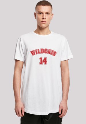 White cotton t-shirt with short sleeves. Features "WILDCATS" and "14" printed in bold red lettering across the chest. Simple crew neck design.
