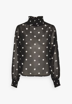 Schwarze transparente Langarmbluse mit weißen Polka-Dots, gerafftem hohem Kragen und enganliegenden Manschetten.