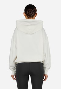 Pegador CLARITA - Sudadera - washed snow white black