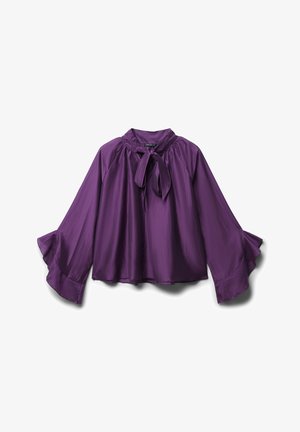 Blouse violette avec un col haut, détail de nœud au cou et longues manches évasées. Fabriquée à partir d'un tissu lisse et léger avec une finition brillante.