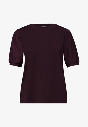 Dunkellila kurzärmliges Shirt mit rundem Halsausschnitt und gepufften, Lochmuster-Ärmeln, die in eng anliegende Bündchen enden.