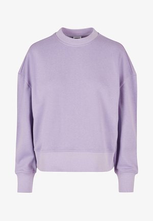 Jasnofioletowy sweatshirt wykonany z miękkiego materiału, z okrągłym dekoltem i ściągaczami przy rękawach. Ma luźny krój z opadającymi szwami ramion.