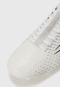 White soccer cleat with a smooth, textured surface, featuring a grid pattern in silver. Includes white laces and a black accent strip.