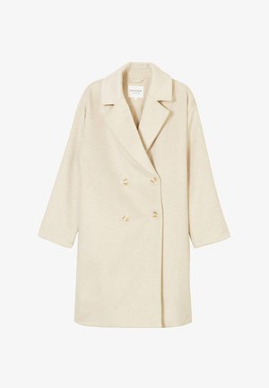 Abrigo beige de doble botonadura con solapa de muesca, que presenta mangas amplias y botones redondos, hecho de una tela suave y texturada.