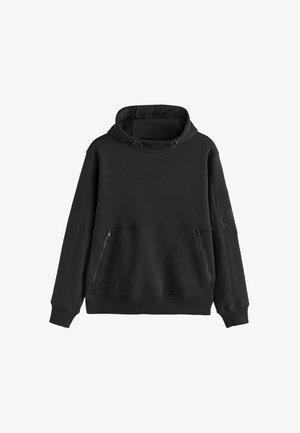 Sort sweatshirt med hætte, med lynlåslommer foran, elastiske manchetter og en struktureret overflade. Minimalistisk design med en afslappet pasform.