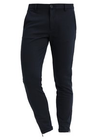 Laivastonsiniset slim fit -housut, valmistettu teksturoidusta kankaasta, joissa on vetoketju edessä, nappikiinnitys ja vetoketjut nilkkahihansuissa säädettävyyttä varten.