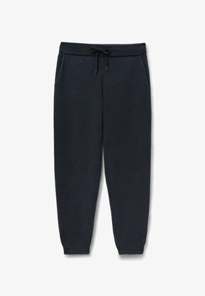 Marineblauwe trainingsbroek van een gestructureerde gebreide stof, met een elastische tailleband met trekkoord, zijzakken en taps toelopende pijpen.