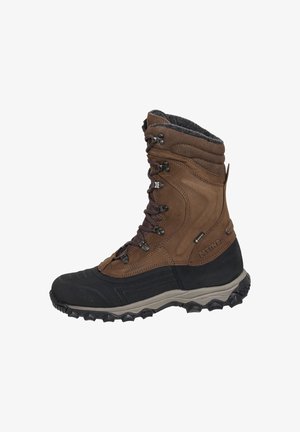 Botte de randonnée en cuir marron avec une tige haute, doublure en polaire grise, œillets en métal et semelle en caoutchouc noir texturé pour une meilleure adhérence.