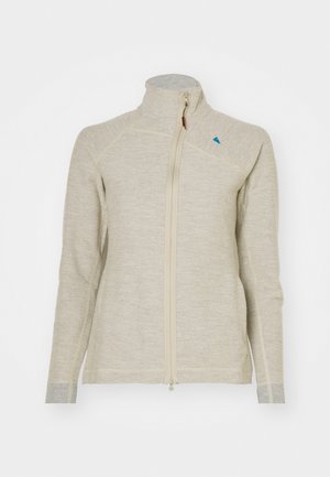 Light beige zip-up jacket with high collar, long sleeves, contrasting gray cuffs, and a small blue logo near the collar. Textured fabric.