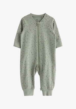 Tutina verde con zip realizzata in morbido cotone, caratterizzata da piccole macchie marroni, polsini a coste e scollo rotondo. Adatta per i più piccoli.
