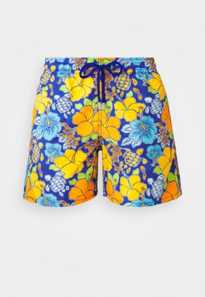 Men's swim shorts featuring a bright floral pattern with blue, orange, and yellow flowers on a navy background. Includes an elastic waistband.