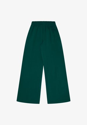 Pantaloni a gamba larga di colore verde scuro, con vita elastica, tasche laterali e un tessuto liscio e testurizzato. Design minimalista.