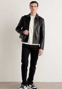 Calvin Klein Jeans MONOGRAM SOFT CAMERA BAG22 - Skulderveske - black