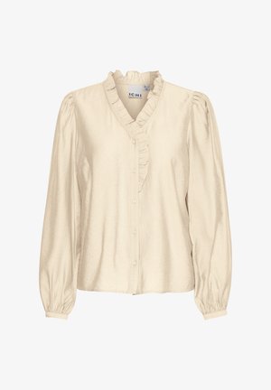 Beżowa bluzka z długim rękawem, z falbaniastym dekoltem, zapinana na guziki, z bufkami. Wykonana z gładkiego materiału o subtelnym połysku.