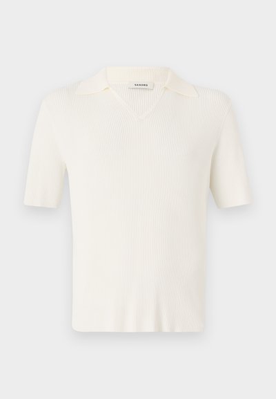 Lyhythihainen, V-kaula-aukko pullover vaaleassa sävyssä, jossa on ribbitekstuuri, pehmeä kauluksen muotoilu ja kapea leikkaus.