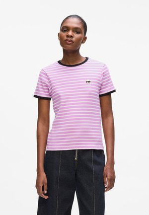 Striped short-sleeve t-shirt in lavender with black accents. Ribbed texture, featuring a small graphic on the chest. Simple, fitted design.