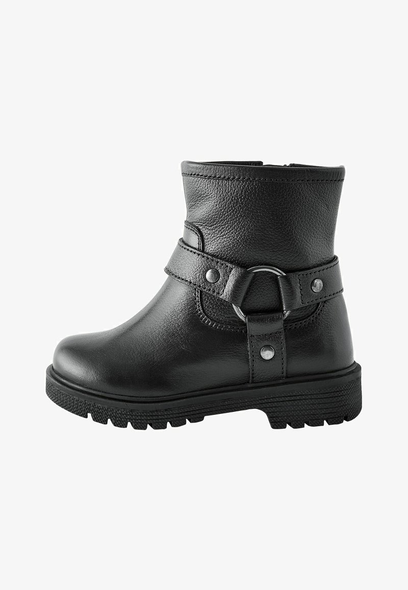 Black leather ankle boot with a rounded toe, a strap and buckle detail, and a textured rubber sole. Cuffs are slightly rolled at the top.