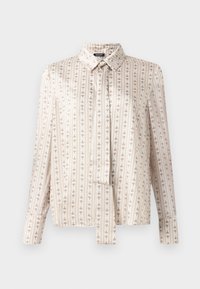 Chemise à manches longues en tissu crème avec des rayures verticales et un motif répété subtil en beige. Présente un col et un devant boutonné.