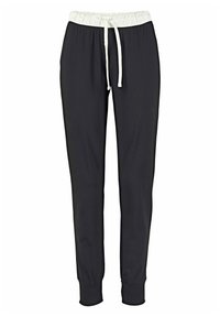 Black jogger pants made of soft fabric, featuring an elastic waistband with drawstring, and ribbed cuffs at the ankles.