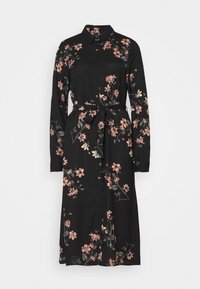 Musta pitkähihainen midimekko, jossa on vaaleanpunaisia ja beigen kukkakuvioita, nappikiinnitys edessä, kaulus ja vastaavasta kankaasta valmistettu vyö, joka on solmittu vyötärölle.